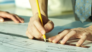 Plans with someone drawing them